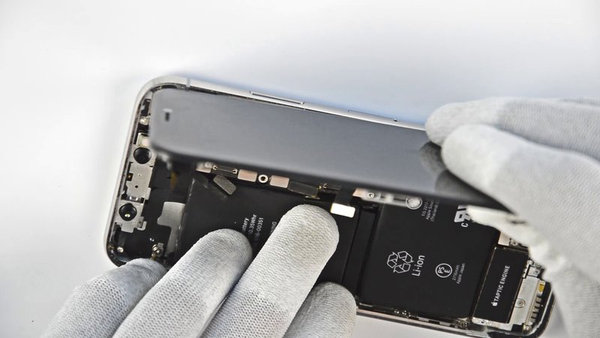 Separating the display assembly from the rare cover